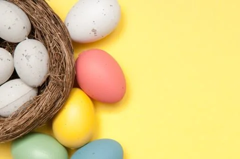 Easter egg background on yellow Stock Photos