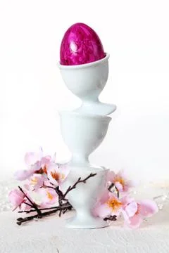 Easter egg balancing act Stock Photos