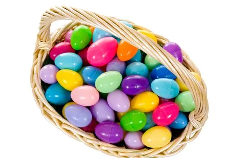 Easter egg basket with multicolored eggs Stock Photos