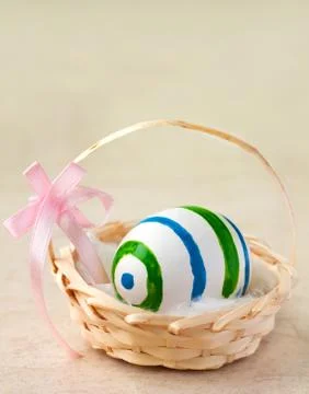 Easter egg in basket Stock Photos