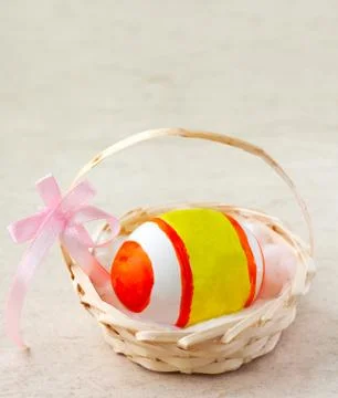 Easter egg in basket Stock Photos