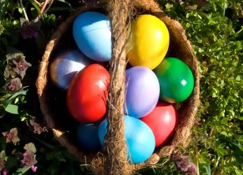 Easter egg in basket Stock Photos