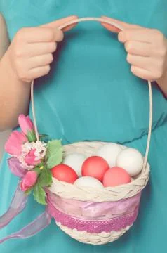 Easter Egg in basket Stock Photos