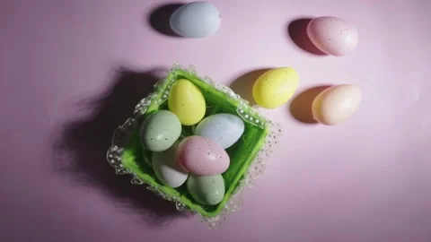 Easter egg basket, spring pink background, DIY decor for the holiday Stock Footage 261379111