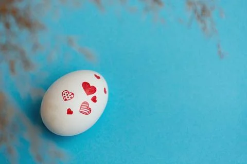 Easter egg on blue background Stock Photos