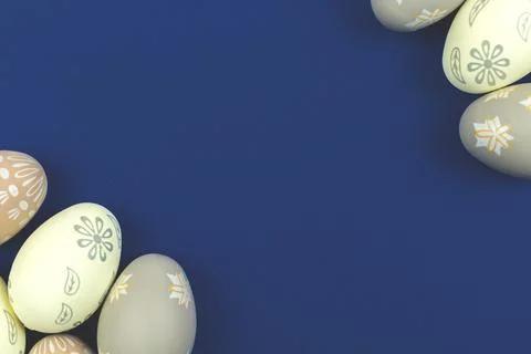 Easter egg border on a blue background, above view with copy space Stock Photos