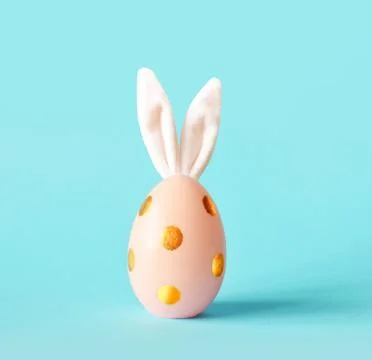 Easter egg with bunny ears. Minimal concept. Stock Photos