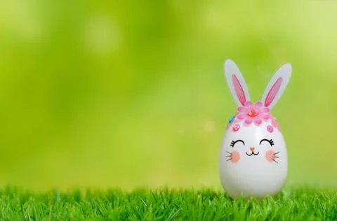 Easter Egg bunny on the grass. Stock Photos