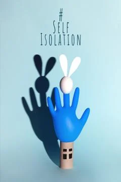 Easter egg bunny on self-insulation. In the toilet paper cabin. A concept on  Stockfoto's