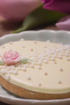Easter egg, closeup, rose flower cookie gingerbread edible decoration Stock Photos