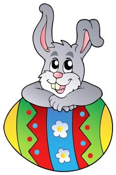 Easter egg with cute lurking bunny Stock Illustration