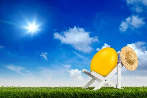 Easter egg on deck chair sun lounger in garden abstract funny concept  blue s Stock Photos