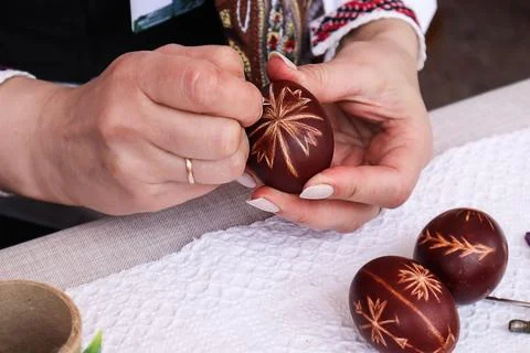 Easter egg in female hands Stock Photos