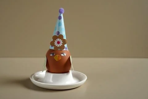 Easter egg figurine DIY. Easter figurine with egg. Easter egg. Funny hares... Stock Photos