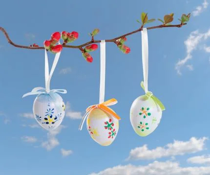 Easter egg on a flowering tree branch Stock Photos