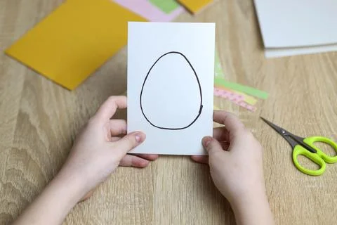 Easter egg gift card. instruction manual. DIY paper craft with your own hands Stock Photos