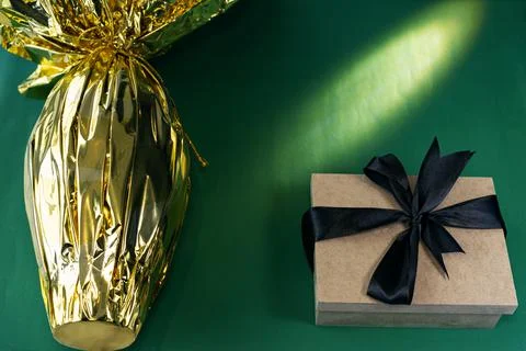 Easter egg with a gift. Stock Photos