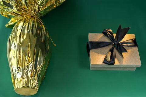 Easter egg with a gift. Stock Photos