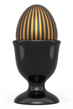 Easter egg with gold and black pattern in egg cup isolated on white backgroun Illustrazione stock