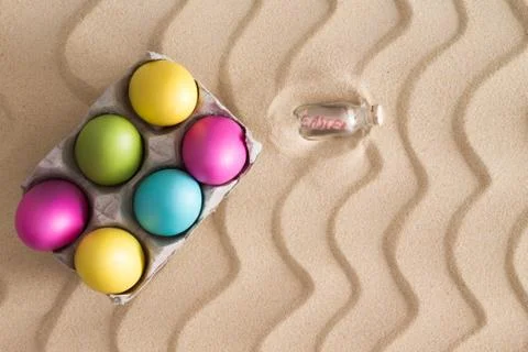 Easter egg hunt at the beach Stock Photos