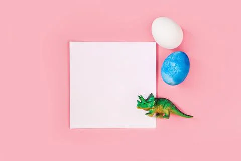Easter egg hunt holiday composition, paper note or list with colorful eggs Stock Photos