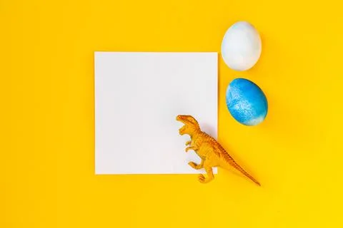 Easter egg hunt holiday composition, paper note or list with colorful eggs Photos
