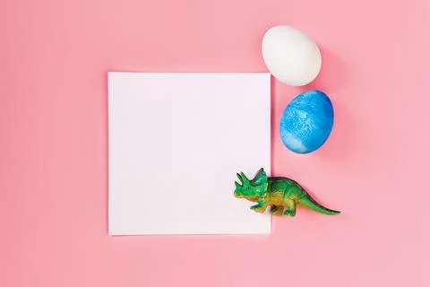 Easter egg hunt holiday composition, paper note or list with colorful eggs Stock Photos