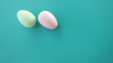 Easter egg hunt, painted decorations, top view, happy easter Stock Footage 234778086