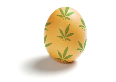 Easter egg with the image of hemp leaves isolated on a white background Stock Photos