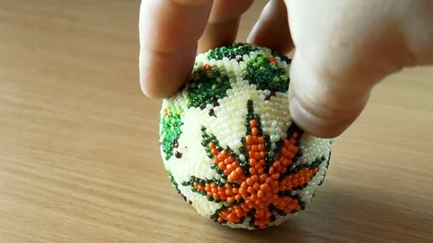 Easter egg inlaid with beads Stock Footage 80754949