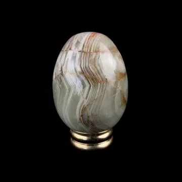 Easter egg with marble texture. Easter egg with marble stains. Fotos de archivo