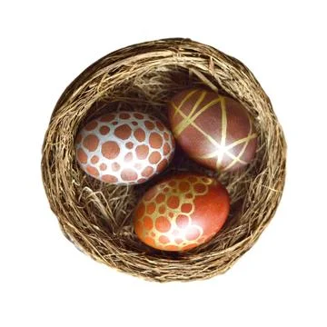 Easter egg in nest isolated on white background, top view Stock Photos