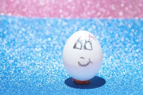 Easter egg with painted fac Stock Photos