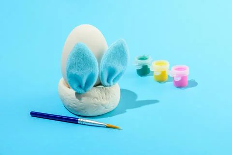 Easter egg painting set with bunny Stock Photos