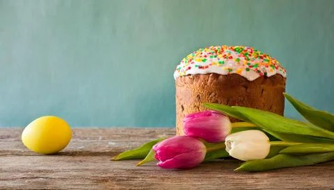Easter egg panettone bread cake background Happy easter spring holiday tulip Stock Photos