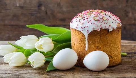 Easter egg panettone bread cake background Happy easter spring holiday tulip Stock Photos