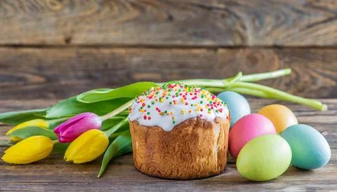 Easter egg panettone bread cake background Happy easter spring holiday tulip Stock Photos