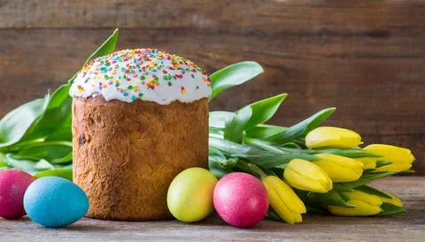 Easter egg panettone bread cake background Happy easter spring holiday tulip Stock Photos