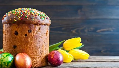 Easter egg panettone bread cake background Happy easter spring holiday tulip Stock Photos