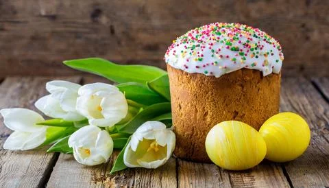 Easter egg panettone bread cake background Happy easter spring holiday tulip Stock Photos
