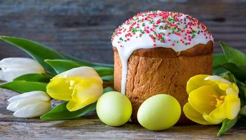 Easter egg panettone bread cake background Happy easter spring holiday tulip Stock Photos