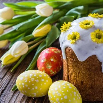 Easter egg panettone bread cake background Happy easter spring holiday tulip Stock Photos