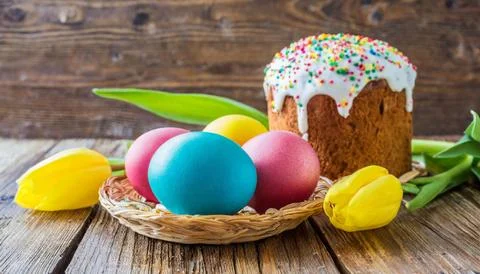 Easter egg panettone bread cake background Happy easter spring holiday tulip Stock Photos
