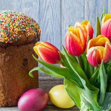 Easter egg panettone bread cake background Happy easter spring holiday tulip Stock Photos