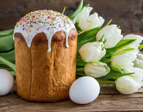 Easter egg panettone bread cake background Happy easter spring holiday tulip Stock Photos