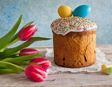 Easter egg panettone bread cake background Happy easter spring holiday tulip Stock Photos