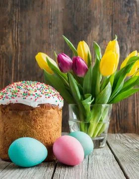 Easter egg panettone bread cake background Happy easter spring holiday tulip Stock Photos
