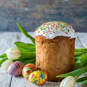 Easter egg panettone bread cake background Happy easter spring holiday tulip Stock Photos