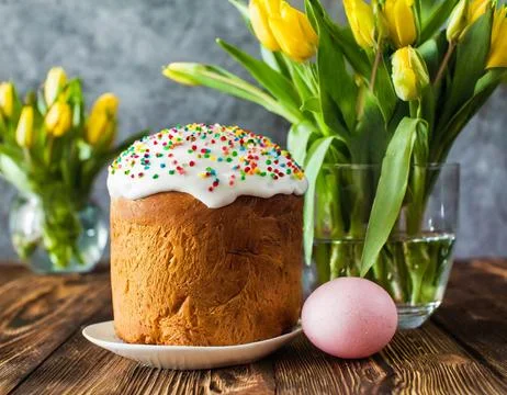 Easter egg panettone bread cake background Happy easter spring holiday tulip Stock Photos