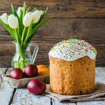 Easter egg panettone bread cake background Happy easter spring holiday tulip Stock Photos